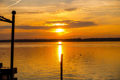 View of calm sea at sunset