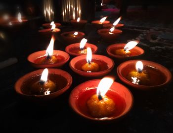 Close-up of lit tea light candles