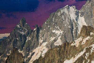 View of the peak of pointe helbronner at the last lights of the day in france europe