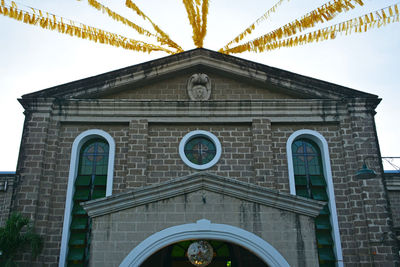 Low angle view of historical building against sky