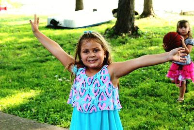 Portrait of happy girl at park