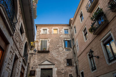 Low angle view of residential buildings against sky