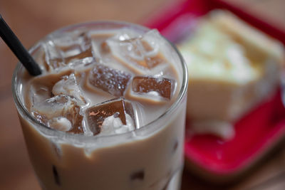 Close-up of coffee in glass on table