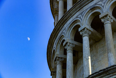 Low angle view of building against blue sky