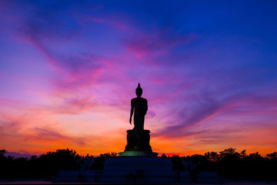 Statue of liberty against sky during sunset