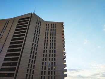 Low angle view of modern building against clear sky