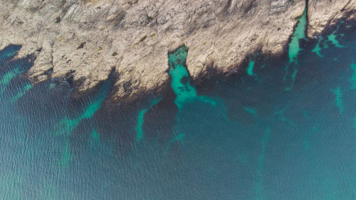 High angle view of rocks on beach