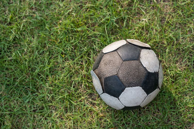 High angle view of soccer ball on grass