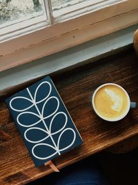 High angle view of coffee cup on table