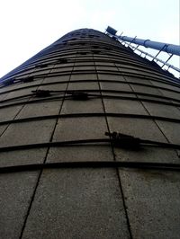 Low angle view of skyscraper against sky