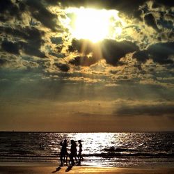 Scenic view of sea at sunset