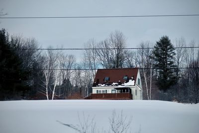 House against sky during winter