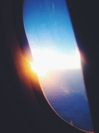 Sun shining through airplane window