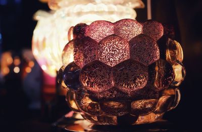 Close-up of illuminated ball on table