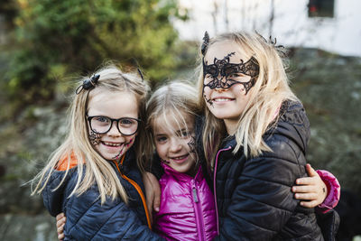 Smiling girls ready for halloween