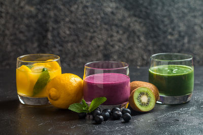 Fruits in glass on table
