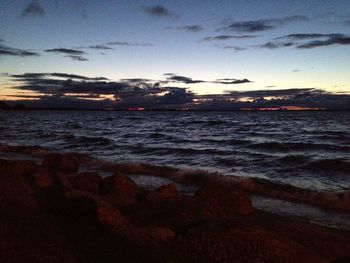 Scenic view of sea against sky at sunset