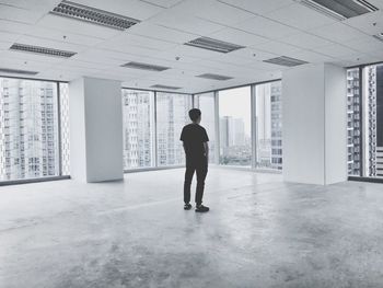 Man standing in empty room