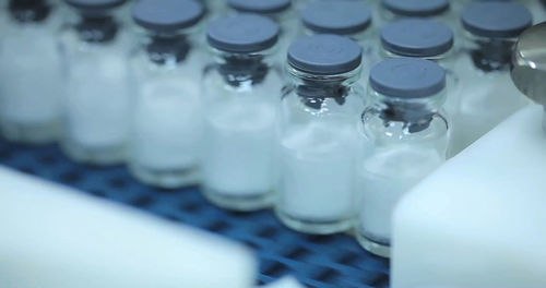 Close-up of glass bottle on table