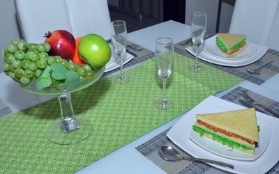 High angle view of tomatoes in plate on table