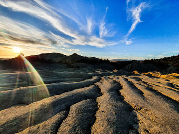 Scenic view of landscape against sky during sunset