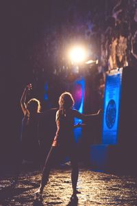 View of illuminated people at night
