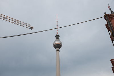 Low angle view of fernsehturm against sky