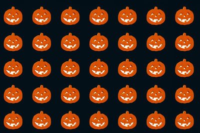 Full frame shot of orange bottles