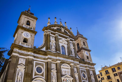 Low angle view of ornate building against sky