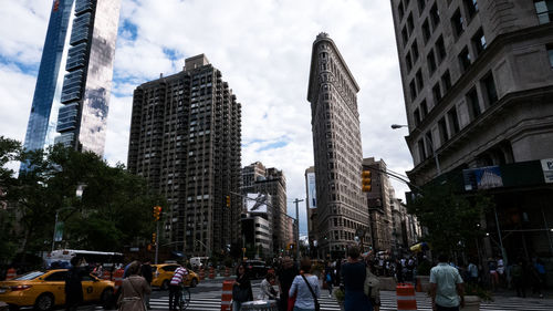 Low angle view of skyscrapers against sky