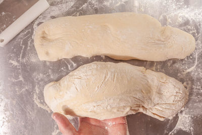 Close-up of hand holding ice cream