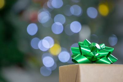 Close-up of green paper in box