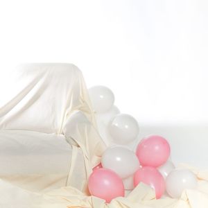 High angle view of balloons against white background