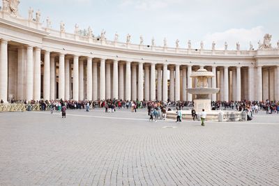 Tourists in front of building