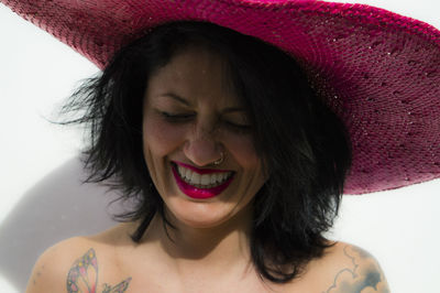 Close-up portrait of a smiling young woman