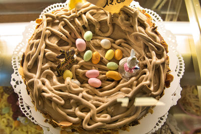 High angle view of multi colored candies in basket