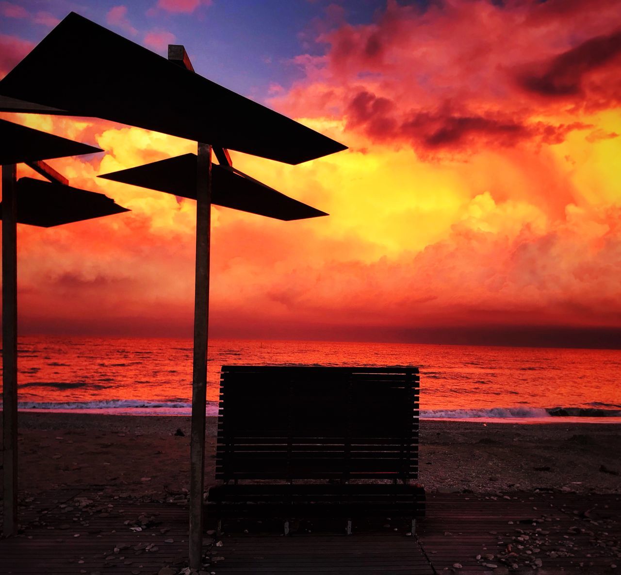 sunset, water, sky, sea, orange color, horizon over water, cloud - sky, horizon, beauty in nature, scenics - nature, tranquility, beach, tranquil scene, land, nature, idyllic, no people, silhouette, outdoors