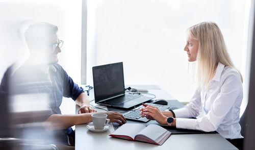 Business colleagues working at office