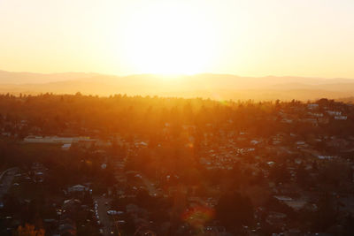 Scenic view of landscape against sky during sunset