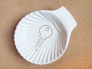 High angle view of white paper on table