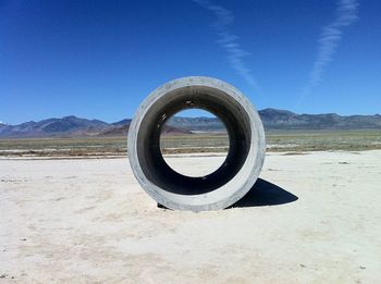 View of landscape against blue sky