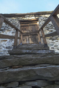 Low angle view of old building against sky