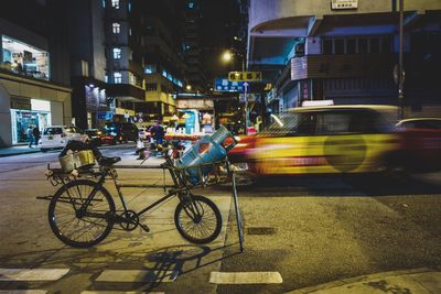 Bicycles on city street at night