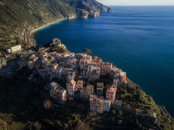 High angle view of townscape by sea