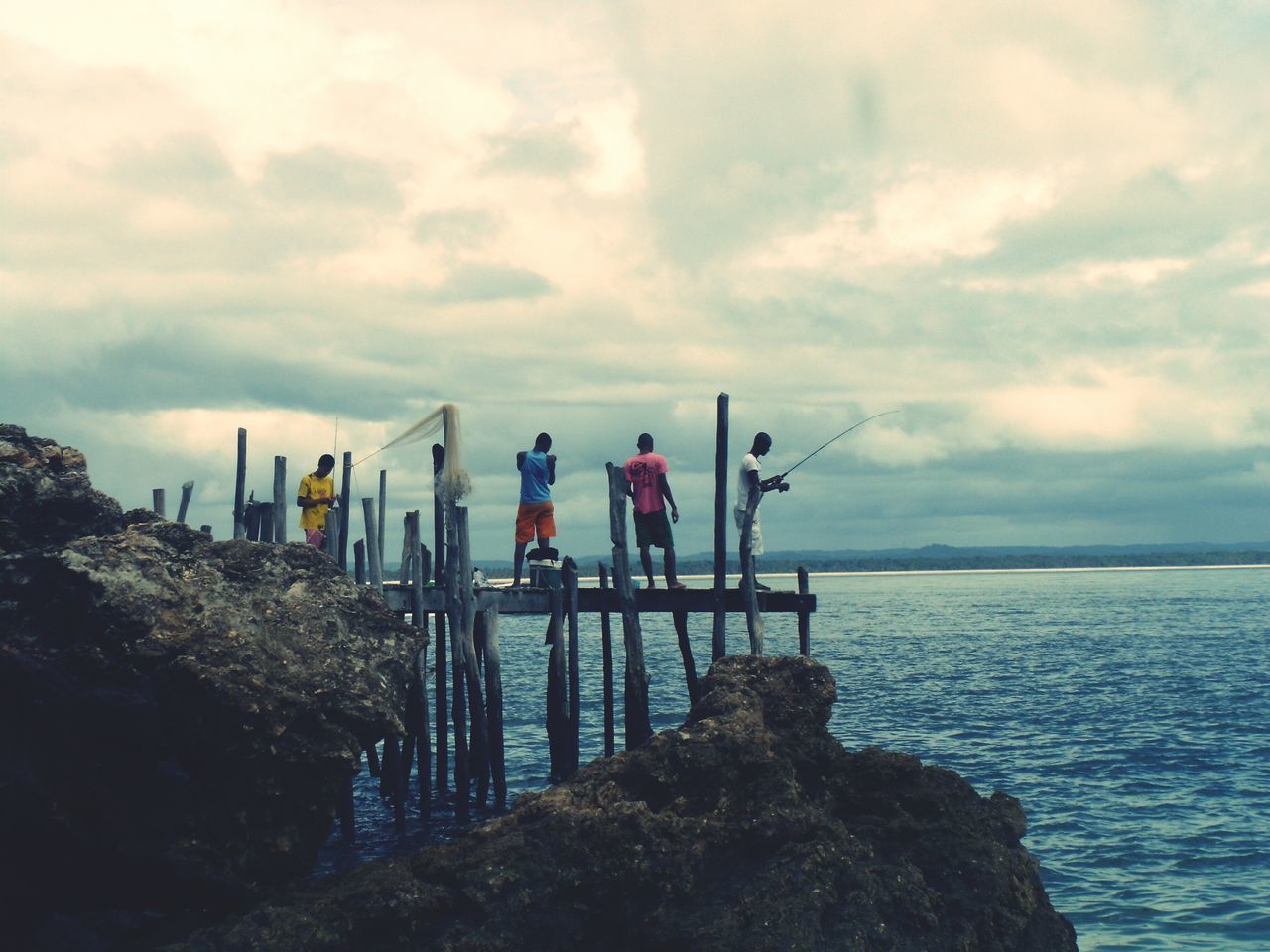 VIEW OF SEA AGAINST CLOUDY SKY