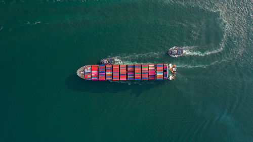 High angle view of ship sailing in sea