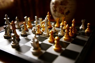 Close-up of chess pieces on board