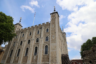 Low angle view of historic building against sky