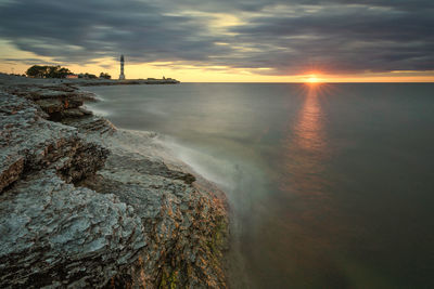 Scenic view of sea against sky during sunset