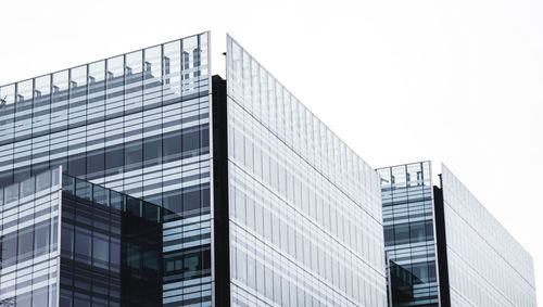 Low angle view of modern building against clear sky